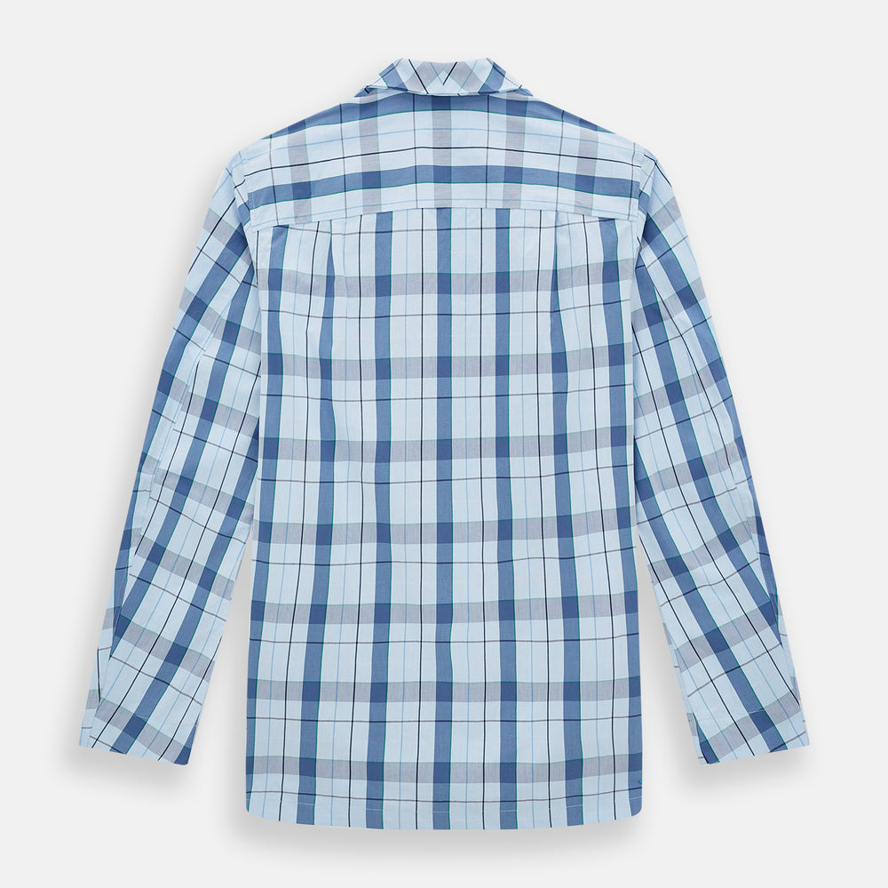The Turnbull & Asser Blue Multi Check Pyjama Shirt features a blue and white check pattern, long sleeves, and a collar—an elegant loungewear option perfect for nightwear.