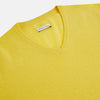 View 2 of product The Turnbull & Asser Canary Yellow Cashmere V-neck Jumper features long sleeves and ribbed cuffs and hem, shown against a white background.