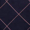 View 3 of product The Turnbull & Asser FONDANT PINK and WINDOW PANE NAVY Silk Tie features a subtle ribbed texture with a pink grid pattern on navy—an elegant choice for polished office attire, shown neatly rolled on a white background.