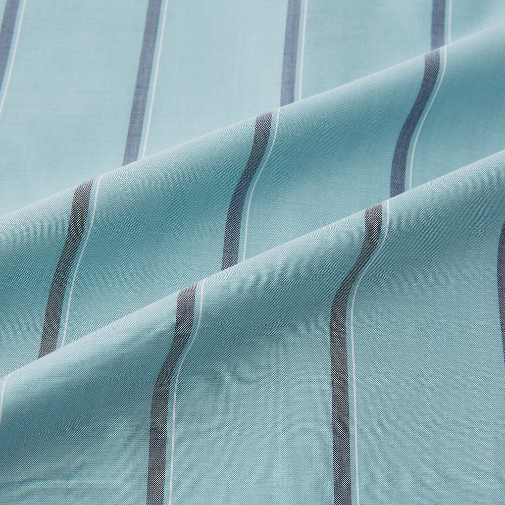 The Light Sage Track Stripe Westminster Shirt by Turnbull & Asser features a Turnbull collar, long sleeves, and vertical track stripes, shown on a white background.