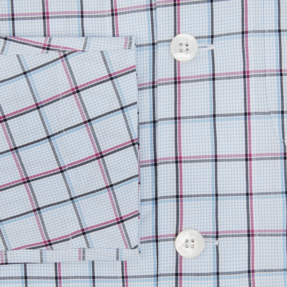 The Turnbull & Asser Burgundy and Blue Check Pyjama Shirt features a classic collar, button-up front, and grid check pattern—an elegant choice for nightwear or comfortable sleepwear.