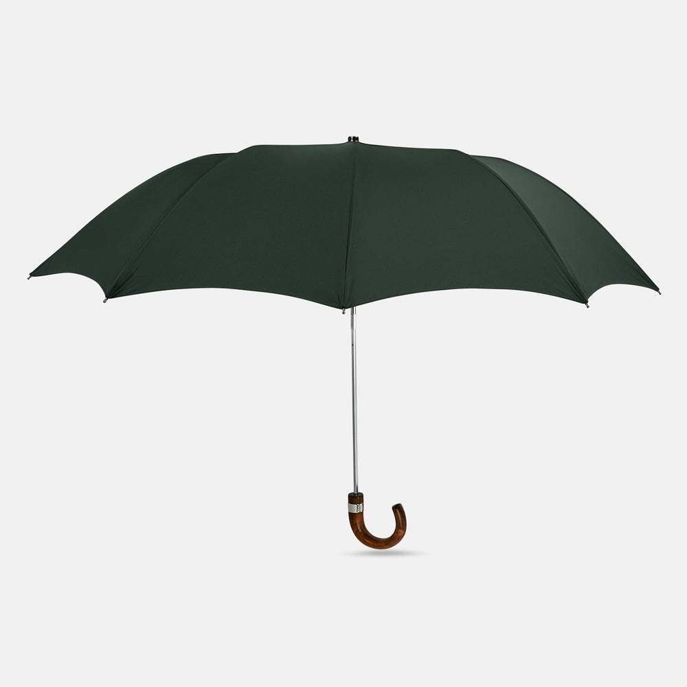 The Turnbull & Asser Forest Green Telescopic Umbrella features a silver shaft and a brown maple crook handle, shown fully open against a plain white background.