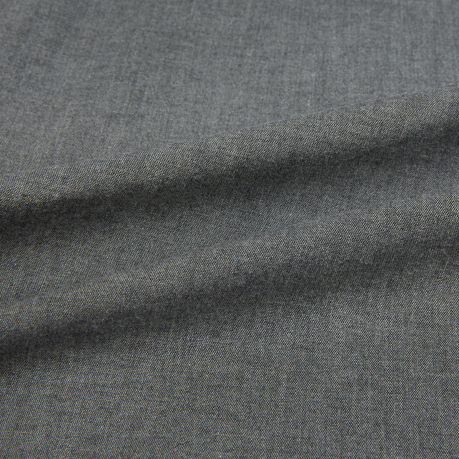 View 8 of product The Pale Charcoal Westminster Shirt by Turnbull & Asser features British craftsmanship with a tailored silhouette, long sleeves, pointed collar, buttoned cuffs, and a solid pale charcoal hue, elegantly shown against a white background.