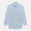 View 1 of product The Turnbull & Asser Pale Blue Cotton Cashmere Derby Collar Richmond Shirt features a soft cotton-cashmere blend, derby collar, white buttons, left chest pocket, and buttoned cuffs, shown laid flat on a white background.