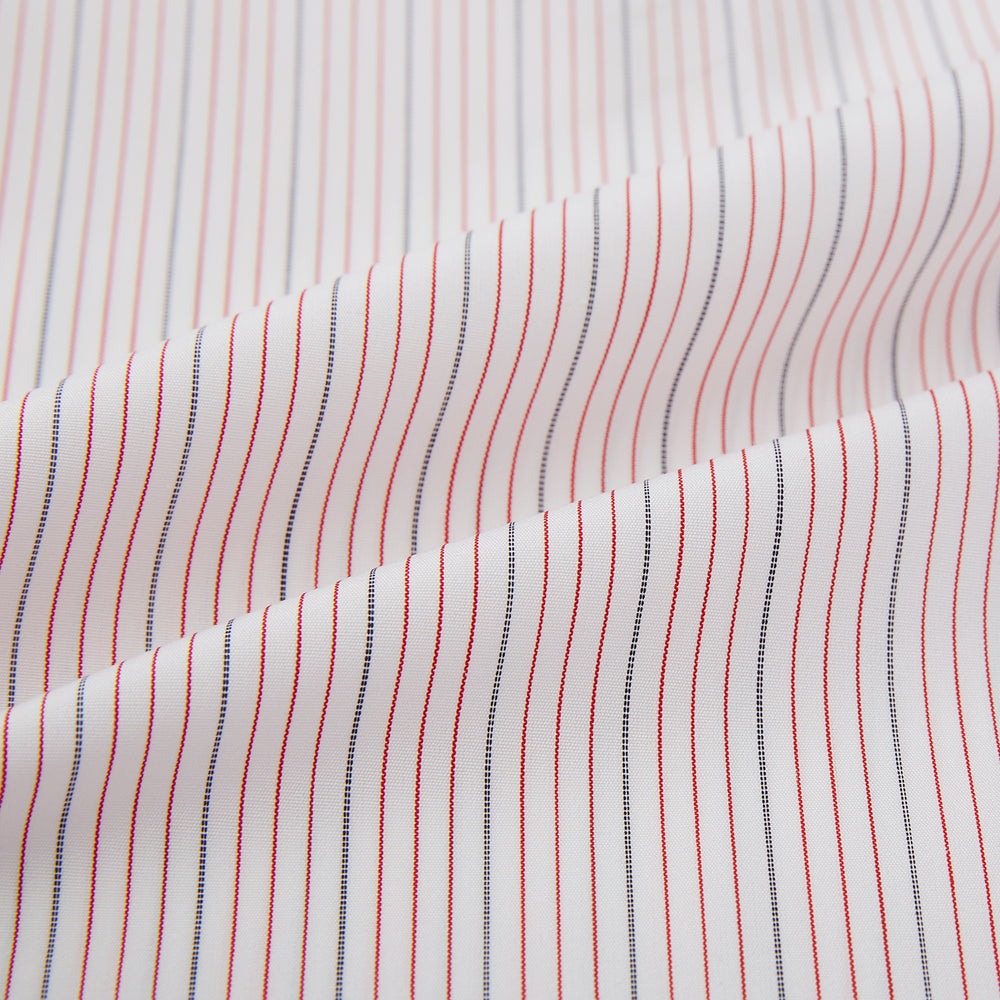 The Red Hairline Stripe Westminster Shirt by Turnbull & Asser features a pointed collar and thin vertical stripes in a light hue, displayed flat against a white background—a fine example of British craftsmanship.