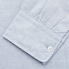 View 3 of product Turnbull & Asser’s Pale Blue Linen Blend Weekend Fit Unwin Shirt features long sleeves, a band collar, two chest pockets, and white buttons—ideal for casual summer wear.