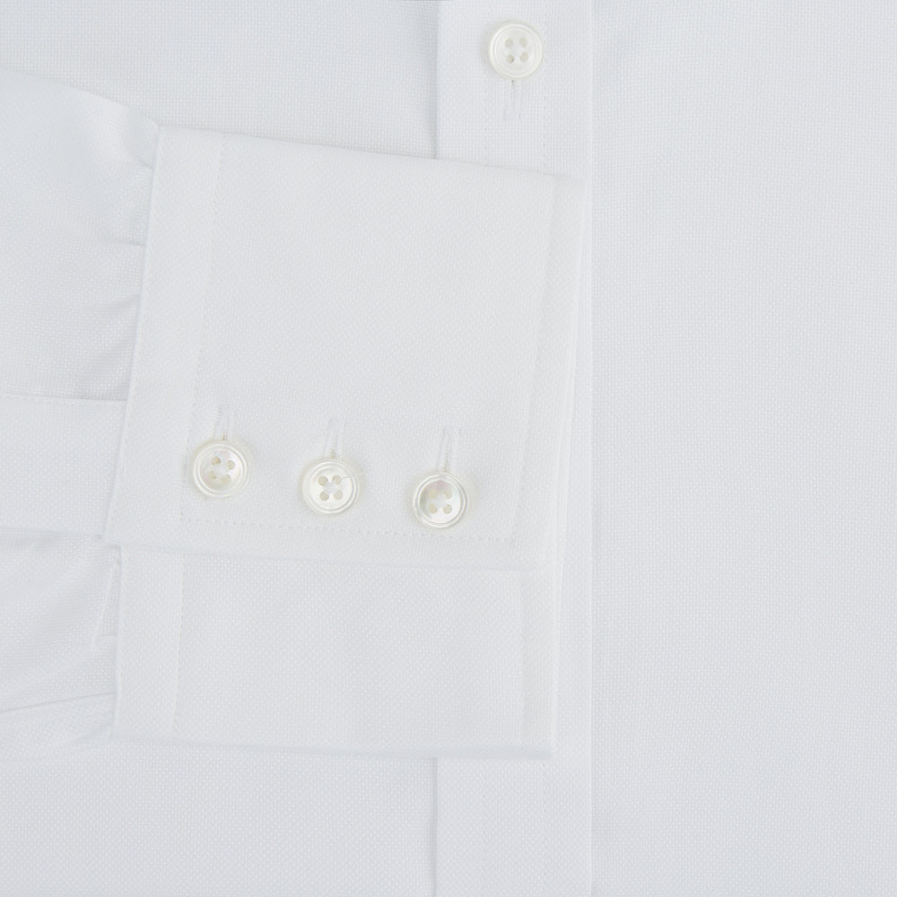The Turnbull & Asser White Royal Oxford Cotton Shirt features a button-down collar and 3-button cuffs, ideal for minimalist looks, displayed on a white background.