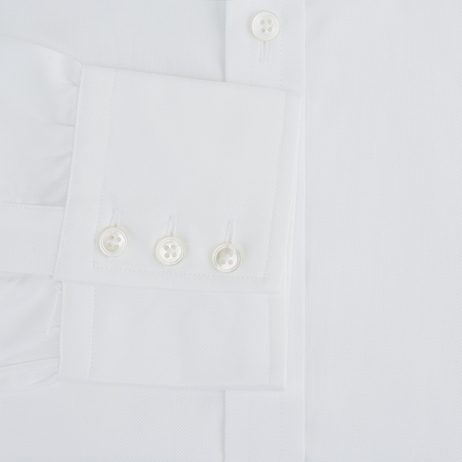 View 3 of product The Turnbull & Asser White Royal Oxford Cotton Shirt features a button-down collar and 3-button cuffs, ideal for minimalist looks, displayed on a white background.
