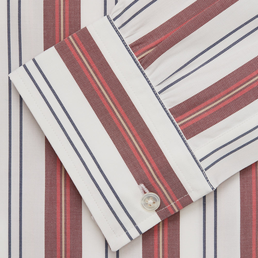 The Turnbull & Asser Red, Blue & White Stripe Weekend Fit Shirt features a Derby collar, 1-button cuffs, and crisp stripes—ideal for stylish winter layering.