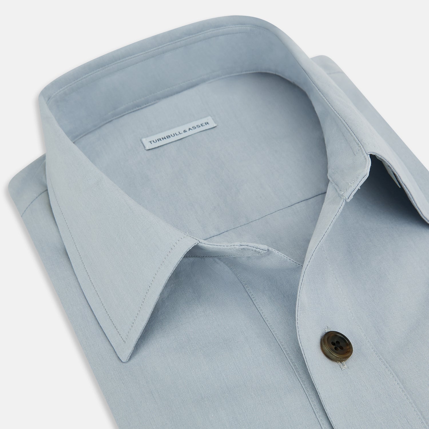 View 2 of product The Turnbull & Asser Grey Hyde Overshirt is a long-sleeve button-up made from sanforised cotton, featuring a single chest pocket and dark buttons, shown against a plain white background.