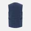 View 3 of product The Denim Blue Quilted Linen Herringbone Waistcoat by Turnbull & Asser features a sleeveless design, five black buttons, two zippered side pockets, and a small chest pocket against a plain white background.