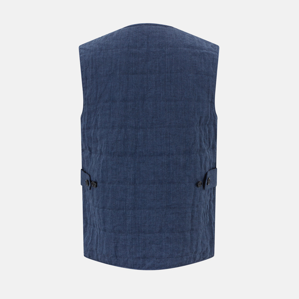 The Denim Blue Quilted Linen Herringbone Waistcoat by Turnbull & Asser features a sleeveless design, five black buttons, two zippered side pockets, and a small chest pocket against a plain white background.
