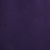 View 3 of product The HOUNDSTOOTH NAVY PLUM TIE by Turnbull & Asser, featuring a textured pattern, is showcased rolled up against a plain white background—an essential accessory.
