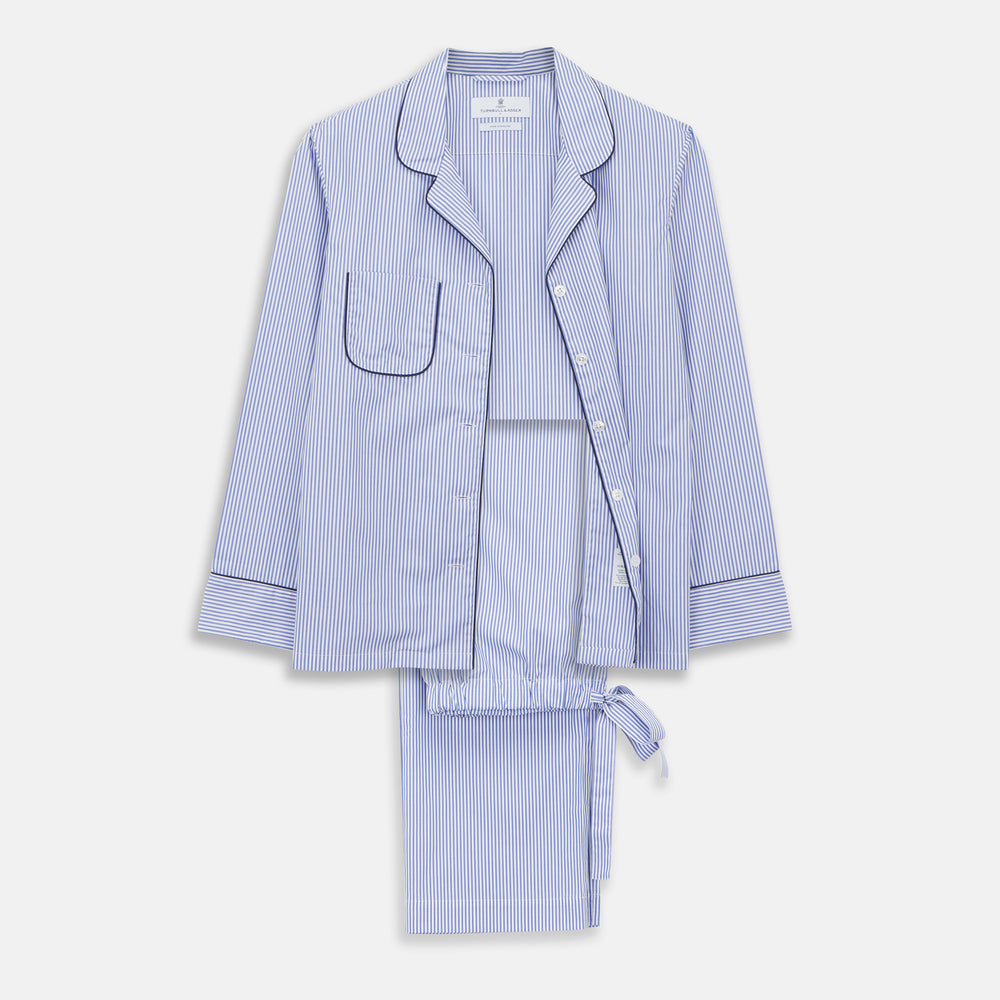 The Turnbull & Asser Women's Harriet Blue Bengal Stripe Pyjama Set features premium cotton, a long-sleeve button-up top with chest pocket, and drawstring pants—an ideal gift option.