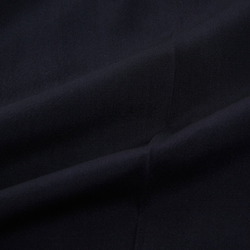 A pair of Midnight Blue Wool Henry Trousers by Turnbull & Asser, with a button closure and straight legs, shown against a plain white background.