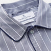 View 4 of product The Turnbull & Asser Pale Blue and White Pinstripe Cotton Blend Sussex Nightshirt pairs classic style with comfort, featuring long sleeves, a collar, front buttons, chest pocket, and curved hemline—perfect for luxury sleepwear.