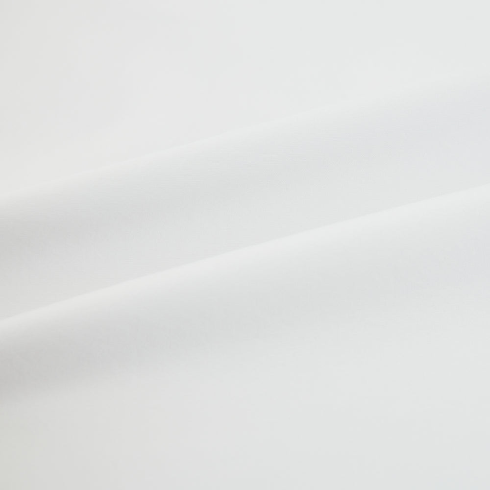 The White Mayfair Shirt by Turnbull & Asser features a classic collar, white buttons, and an inner branded label, all neatly crafted from premium sanforised cotton for lasting quality.