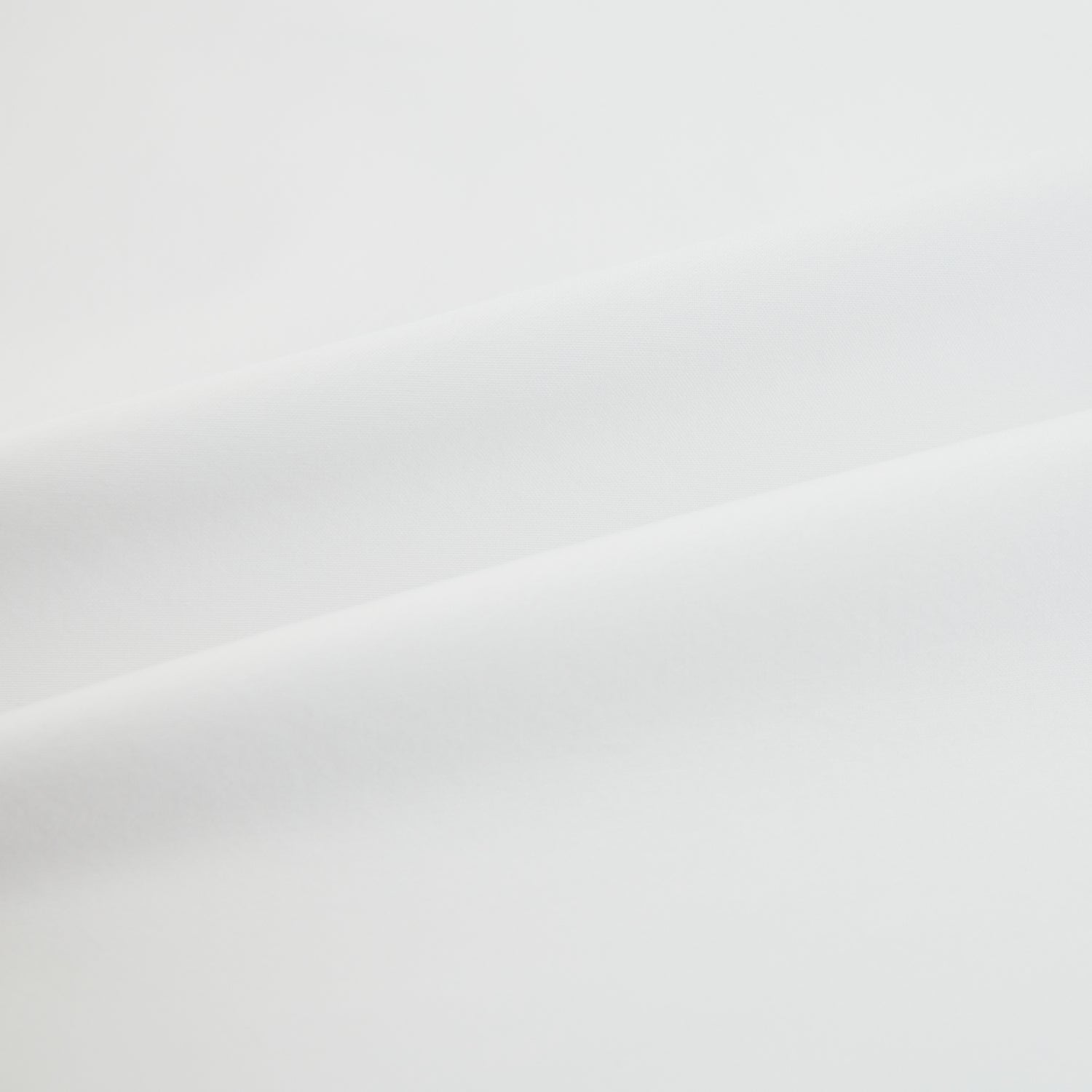 View 6 of product The White Mayfair Shirt by Turnbull & Asser features a classic collar, white buttons, and an inner branded label, all neatly crafted from premium sanforised cotton for lasting quality.