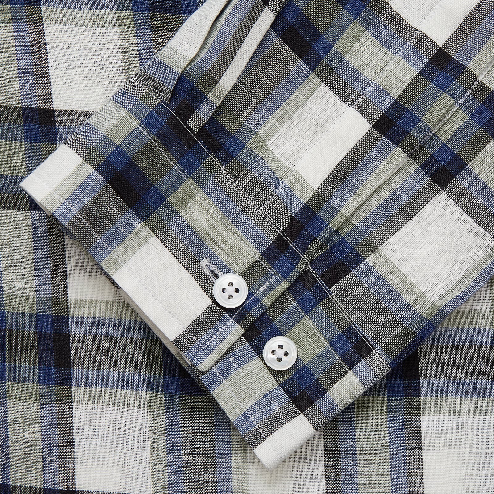 View 2 of product A Green Multi Check Linen Holiday Fit Winnington Shirt by Turnbull & Asser, featuring a check pattern and revere collar, displayed flat on a white background.