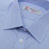 View 5 of product The Turnbull & Asser Blue Hairline Stripe Shirt features a T&A collar, 3-button cuffs, and subtle stripes, displayed neatly folded against a plain white background.