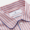 View 4 of product The Orange Multi Stripe Cotton Sussex Nightshirt by Turnbull & Asser features a classic collar, red and white vertical stripes, a chest pocket with blue trim, button-down front, and curved hem—a luxe take on the traditional nightshirt.