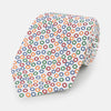 View 1 of product The Turnbull & Asser Confetti Circle White Silk Tie features colorful rings in red, orange, blue, and green scattered across a crisp white background.