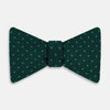 View 1 of product The Turnbull & Asser Dark Green and Navy Micro Dot Silk Bow Tie, featuring a refined dotted pattern, is showcased on a plain white background—an elegant accessory perfect for any occasion.