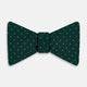 The Turnbull & Asser Dark Green and Navy Micro Dot Silk Bow Tie, featuring a refined dotted pattern, is showcased on a plain white background—an elegant accessory perfect for any occasion.