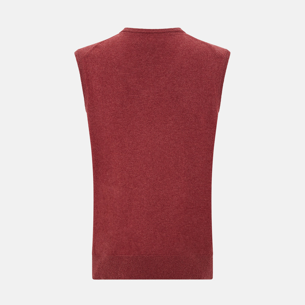 A refined piece from Turnbull & Asser, the Antique Pink Cashmere V-Neck Vest features a sleeveless design with a ribbed hem, shown against a plain white background.