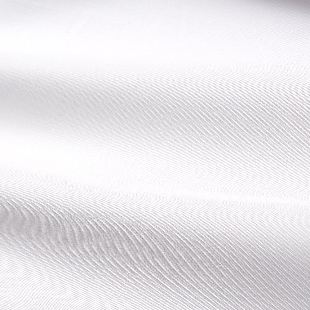 The White Cotton Tailored Bianca Shirt by Turnbull & Asser features a pointed collar and button cuffs, crafted from soft organic cotton and displayed flat on a white background for timeless elegance.