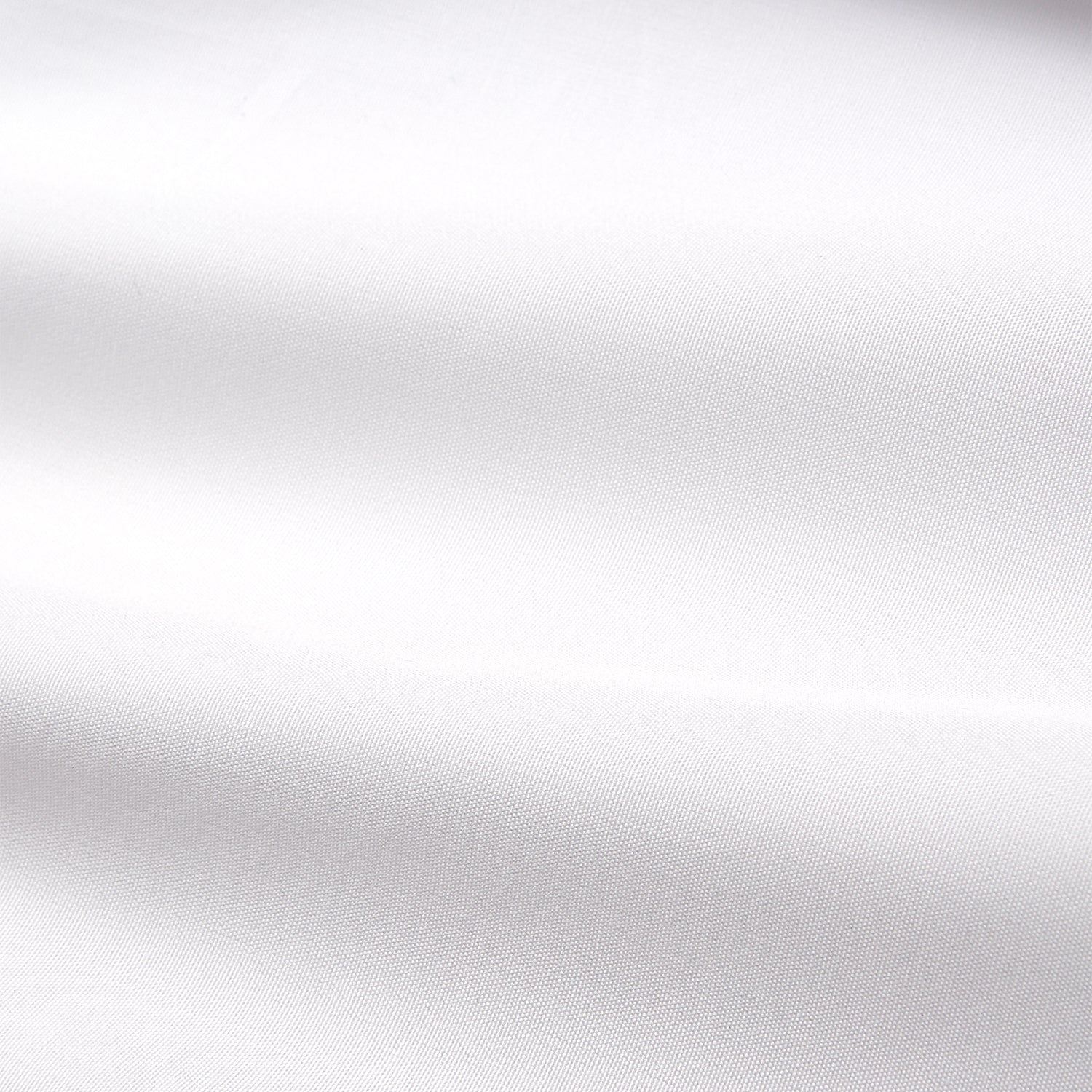 View 7 of product The White Cotton Tailored Bianca Shirt by Turnbull & Asser features a pointed collar and button cuffs, crafted from soft organic cotton and displayed flat on a white background for timeless elegance.