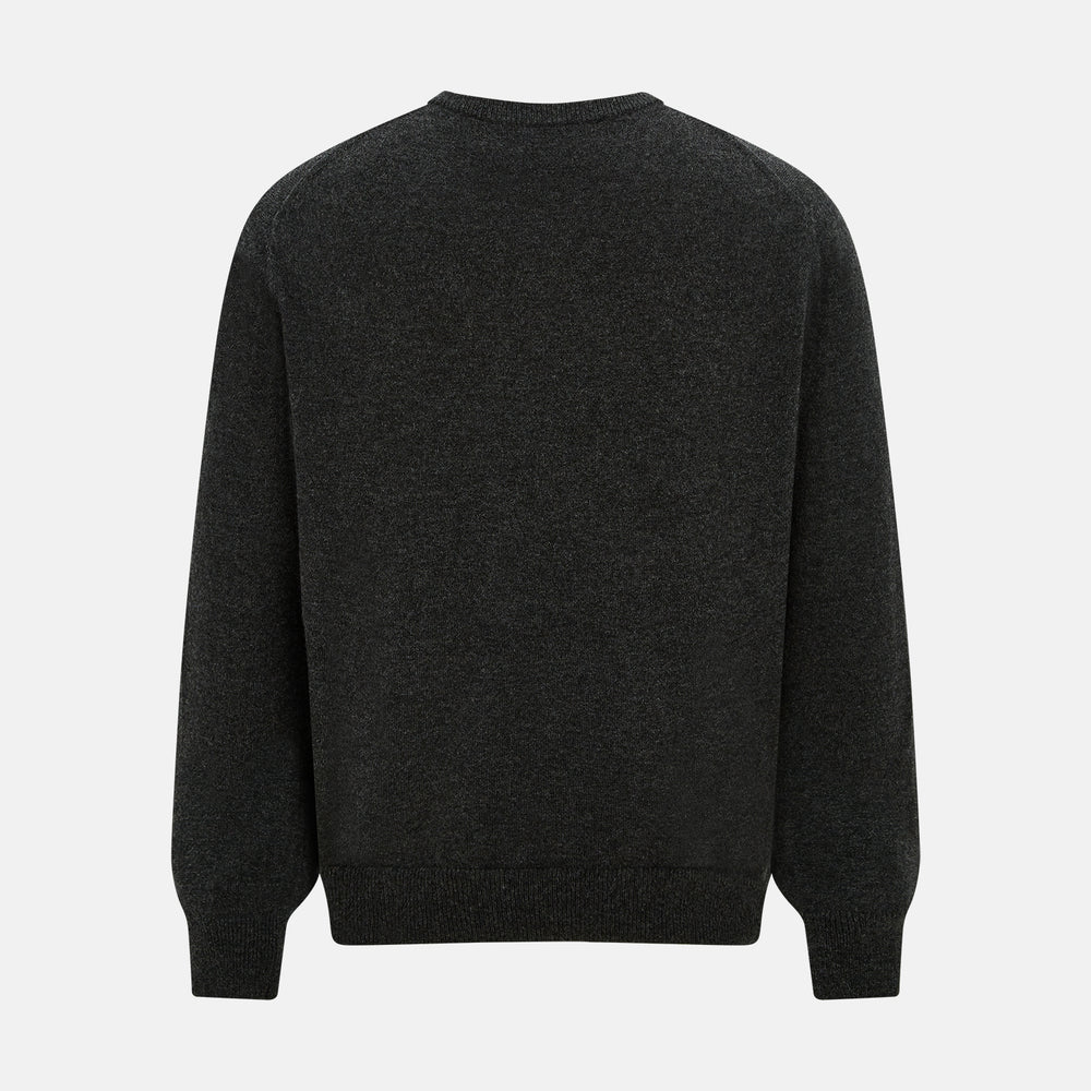 The Turnbull & Asser Dark Grey Cashmere Round Neck Jumper features a classic, plain long-sleeve design and is displayed on a white background.