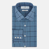 View 5 of product The Turnbull & Asser Steel Grey Grid Check Mayfair Shirt is a long-sleeve, button-up shirt in light blue Italian cotton, shown against a plain white background.