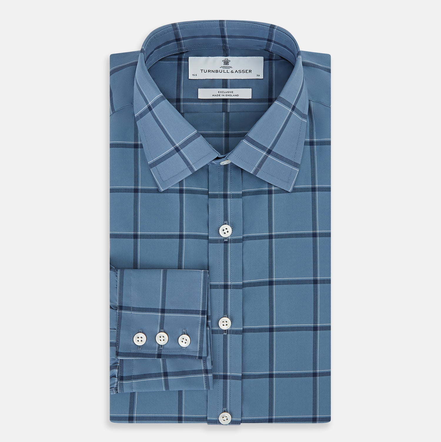 View 5 of product The Turnbull & Asser Steel Grey Grid Check Mayfair Shirt is a long-sleeve, button-up shirt in light blue Italian cotton, shown against a plain white background.