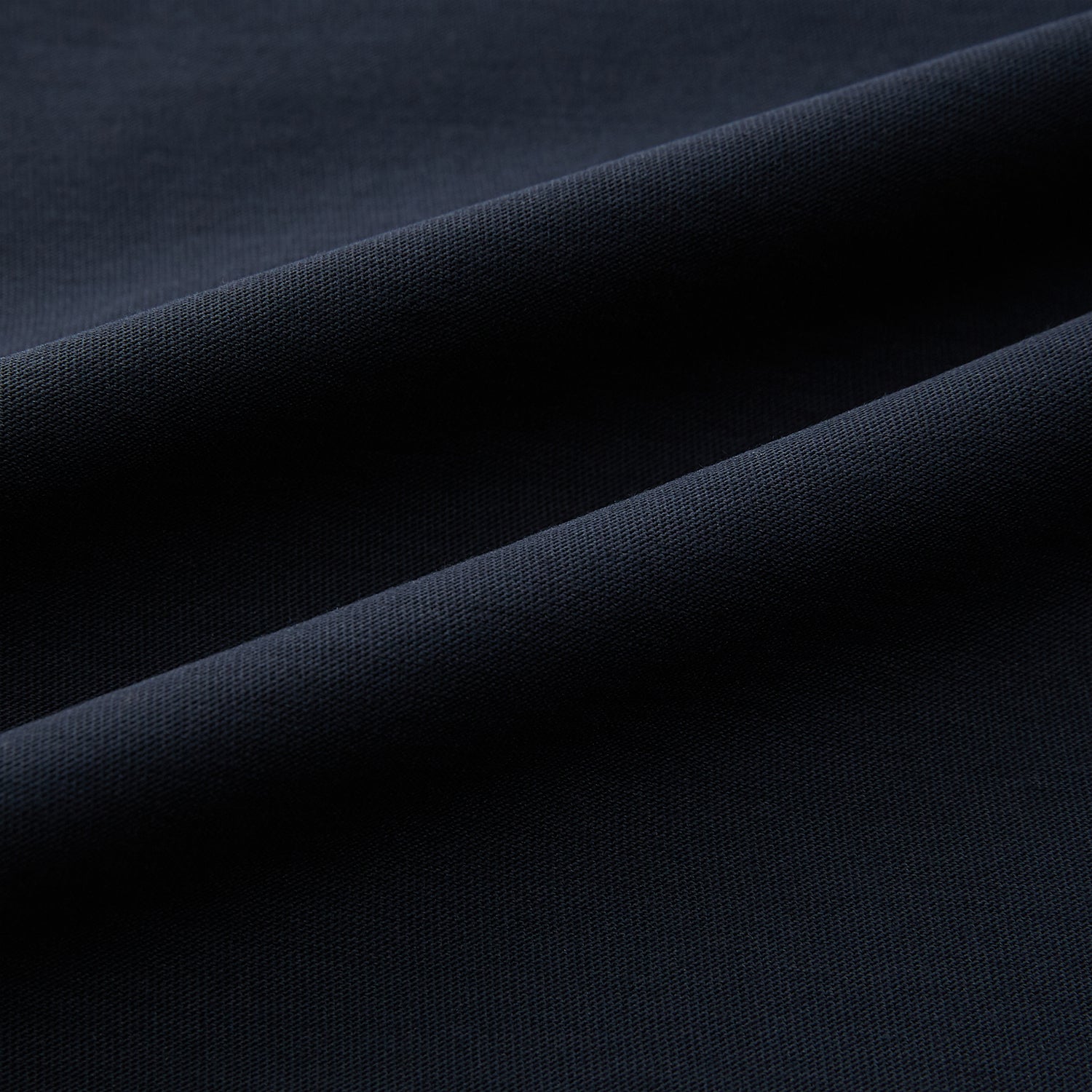 View 6 of product A versatile, high-quality navy short-sleeve t-shirt by Turnbull & Asser, featuring a classic crew neckline, laid flat on a white background.