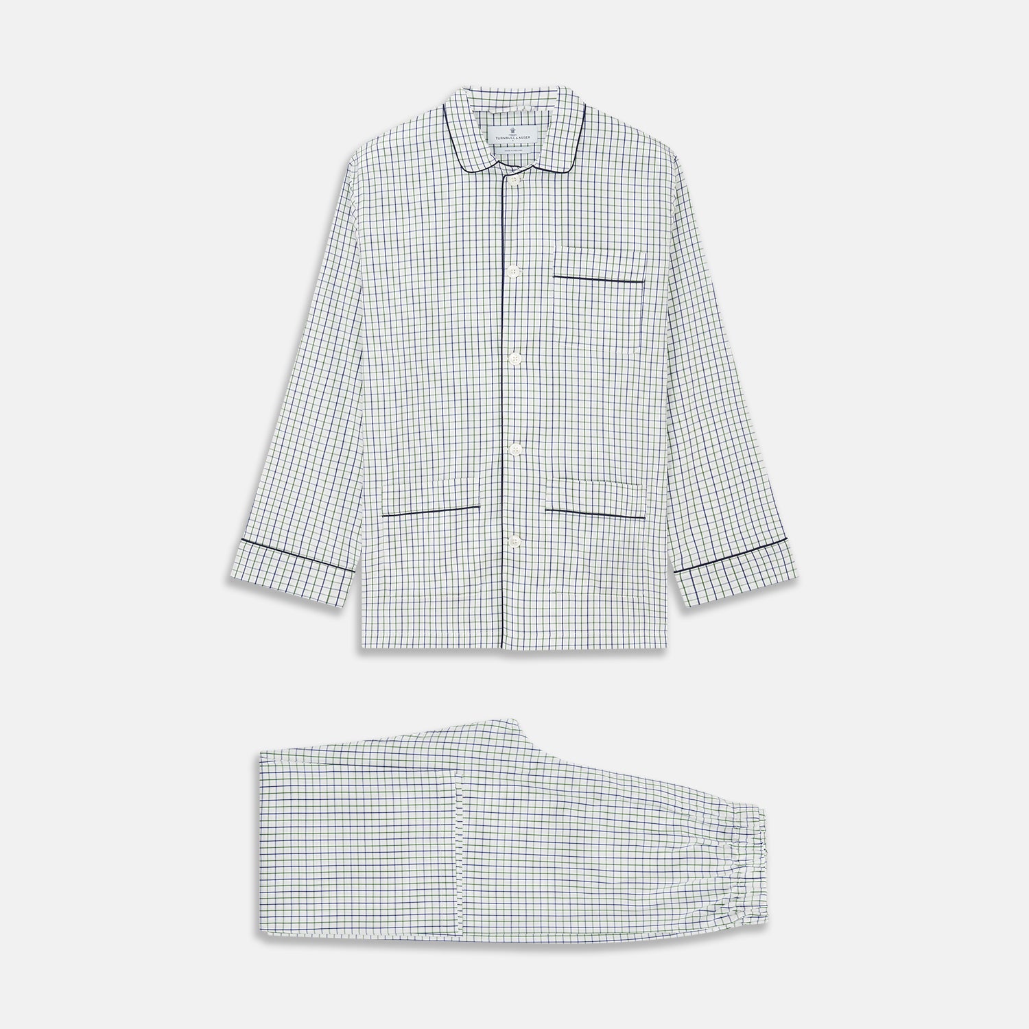 View 1 of product The Turnbull & Asser Green and Blue Check Cotton Hyde Pyjama Set for men features a long-sleeve, button-up top and pants with contrasting dark piping, shown laid flat on a white background.