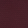 View 3 of product The Turnbull & Asser 7 fold Grenadine Silk Plain Tie is shown rolled on a white background, highlighting its textured maroon design as a versatile addition to any wardrobe.