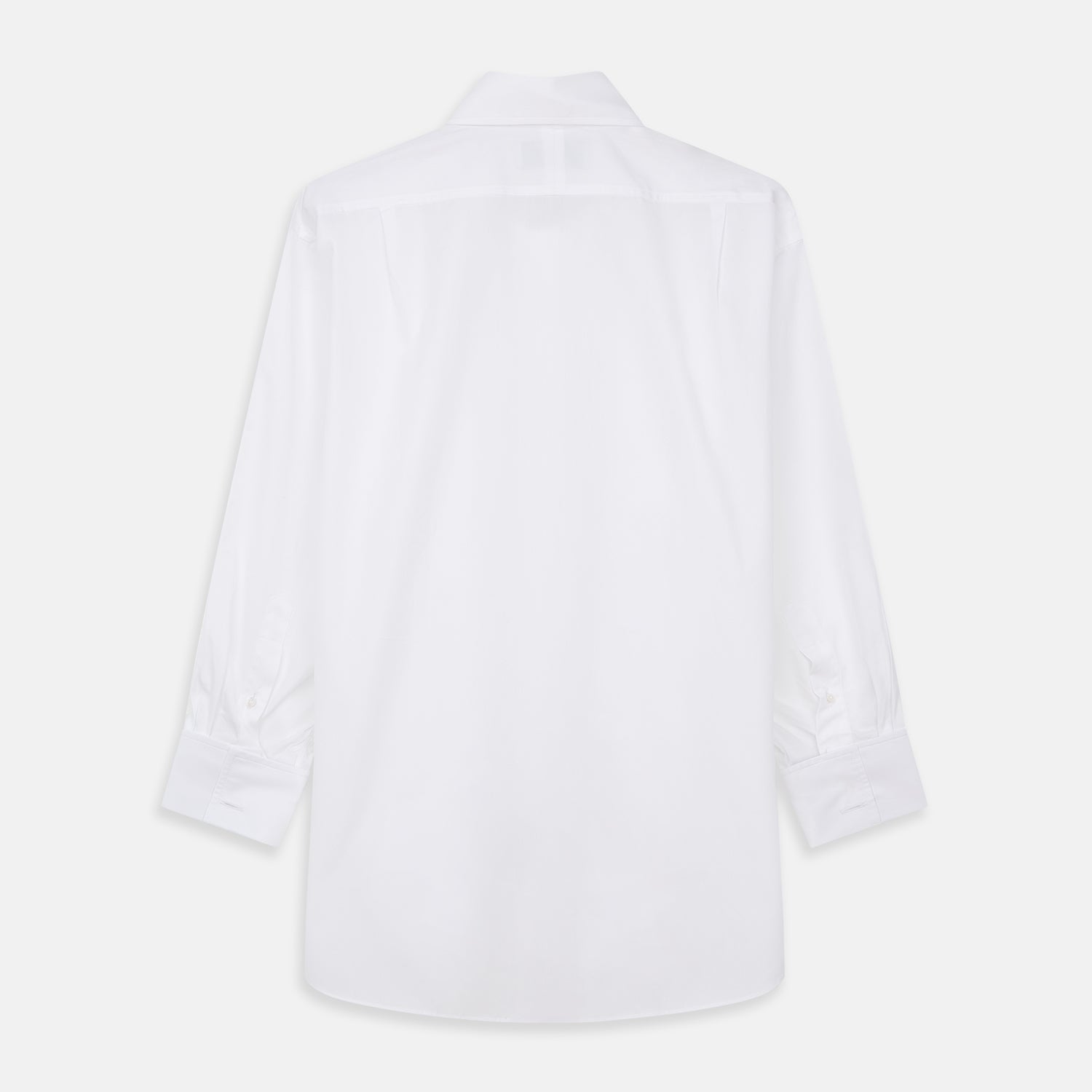 View 11 of product A woman with straight brown hair pulled back wears the Turnbull & Asser White Cotton Marlene Shirt, featuring classic menswear details, paired with high-waisted cream trousers against a neutral background.