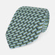 The Turnbull & Asser Light Blue and Chartreuse Lemon Weave Patterned Silk Tie, crafted from fine English silk, features a geometric design in blue and green tones, displayed on a plain white background.