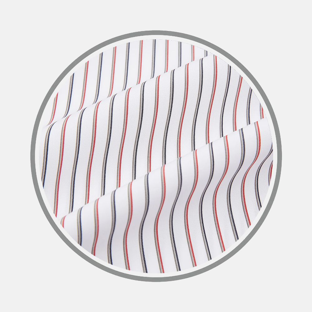Close-up of Turnbull & Asser’s Red Double Stripe Fabric, featuring white fabric with evenly spaced vertical red and navy blue stripes, displayed in a circular frame on a light gray background.