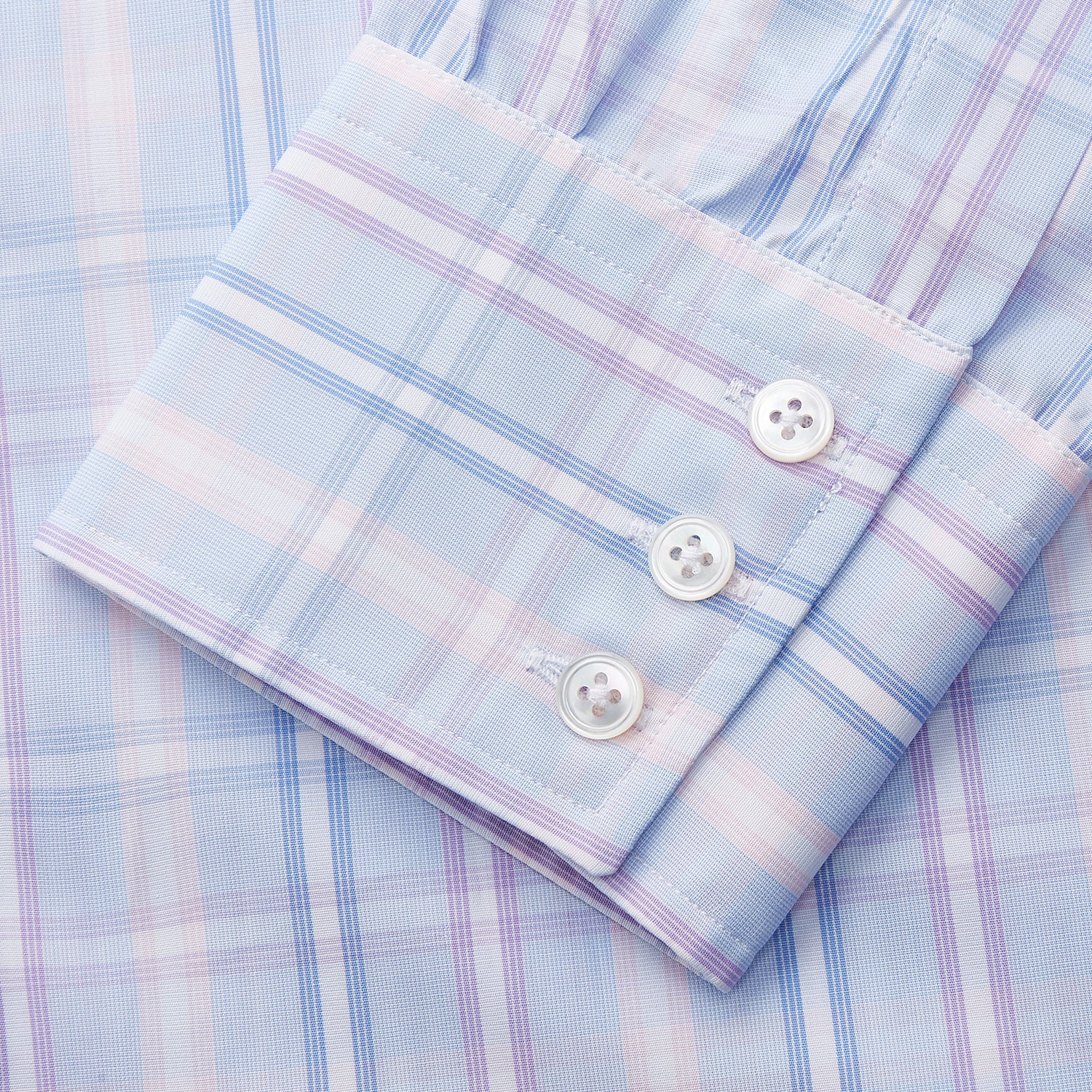 View 2 of product The Turnbull & Asser Pink and Light Blue Check Cotton Regular Fit Mayfair Shirt features long sleeves, buttoned cuffs, a T&A collar, and is shown laid flat on a white background.