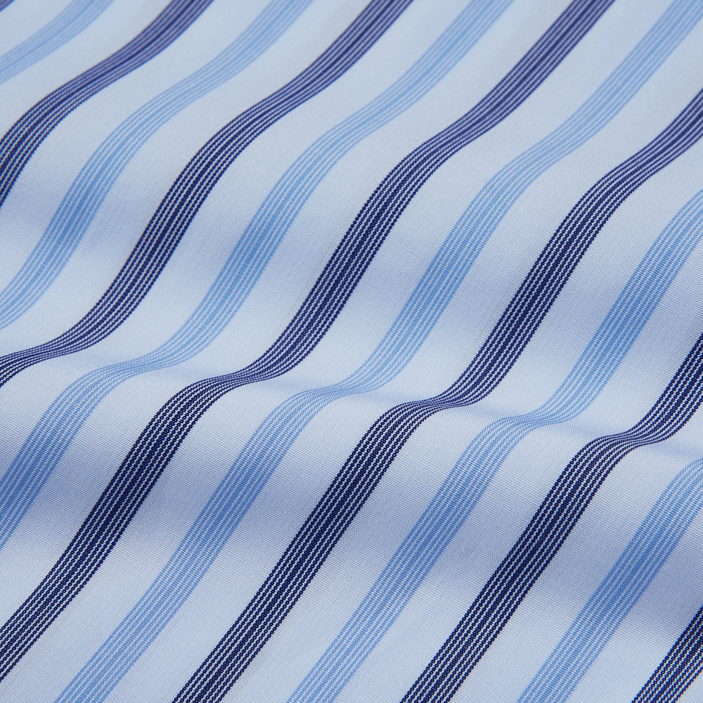 The Turnbull & Asser Pale Blue Multi Stripe Cotton Regular Fit Whitby Shirt, with collar and cuffs, is shown laid flat on a white background.