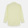 View 5 of product The Turnbull & Asser Yellow Linen Regular Fit Mayfair Shirt is a long-sleeve button-up with a collar and buttoned cuffs, shown laid flat on a white background.