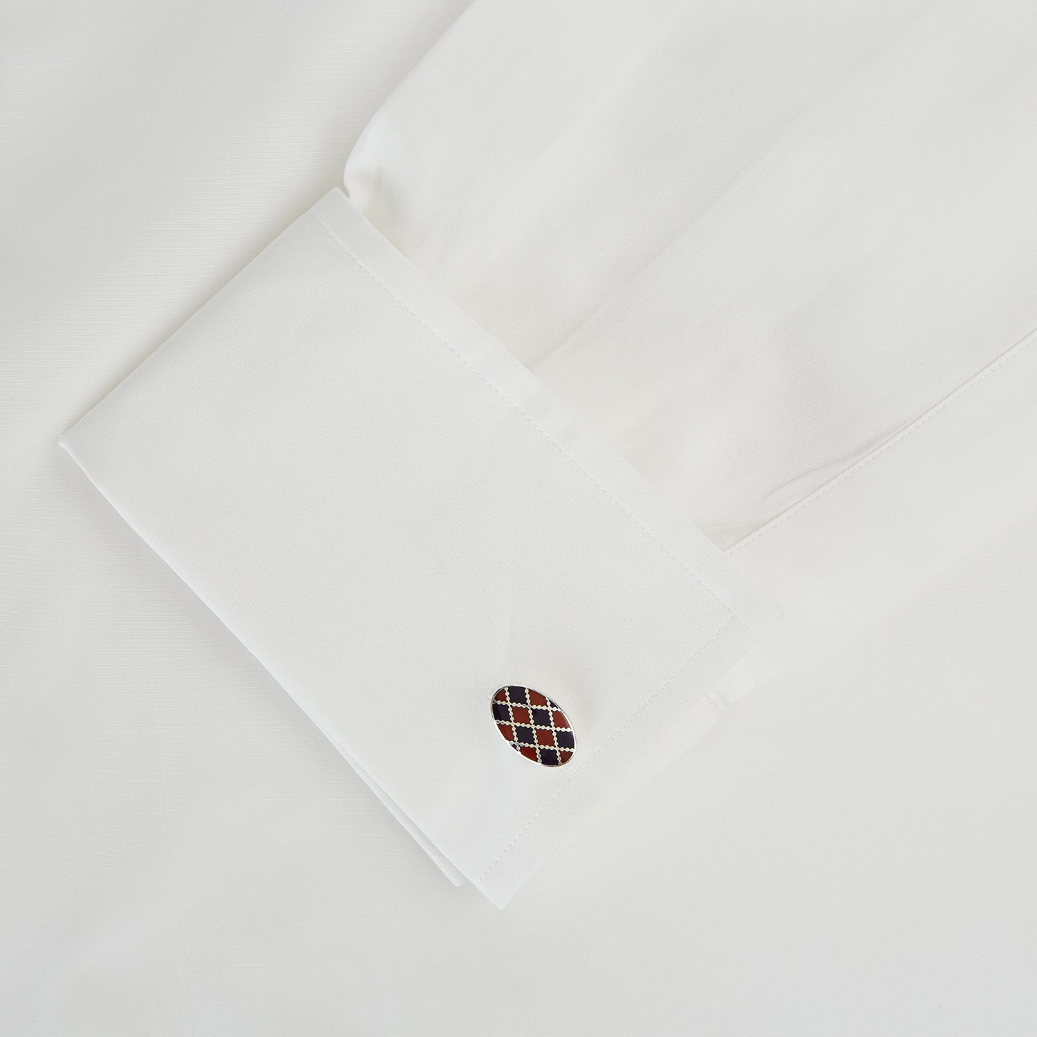 View 3 of product Displayed on a white background, the Turnbull & Asser Burgundy and Navy Checkered Oval Enamel Cufflinks capture masculine elegance with their geometric enamel design.