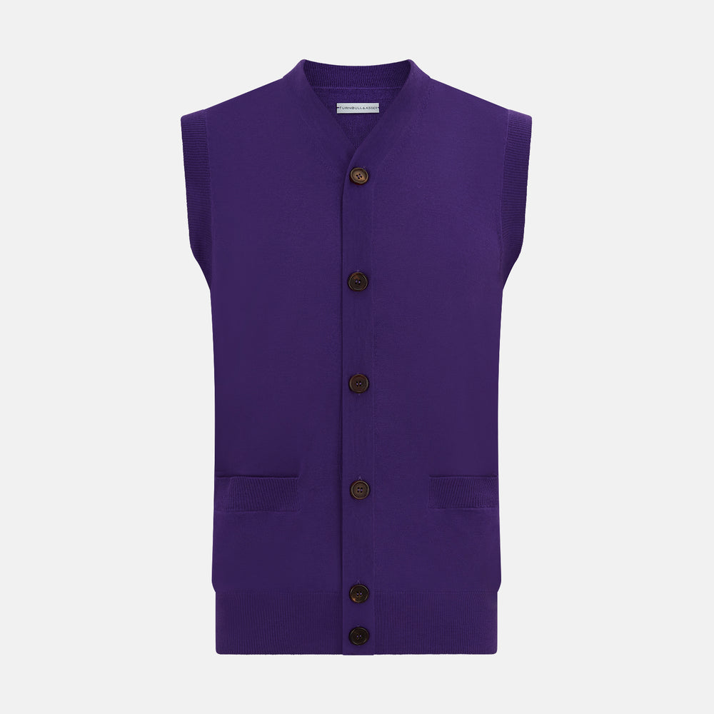 The Turnbull & Asser Purple Fine Merino V-Neck Sleeveless Cardigan features a button-up front and two pockets, displayed against a plain white background.