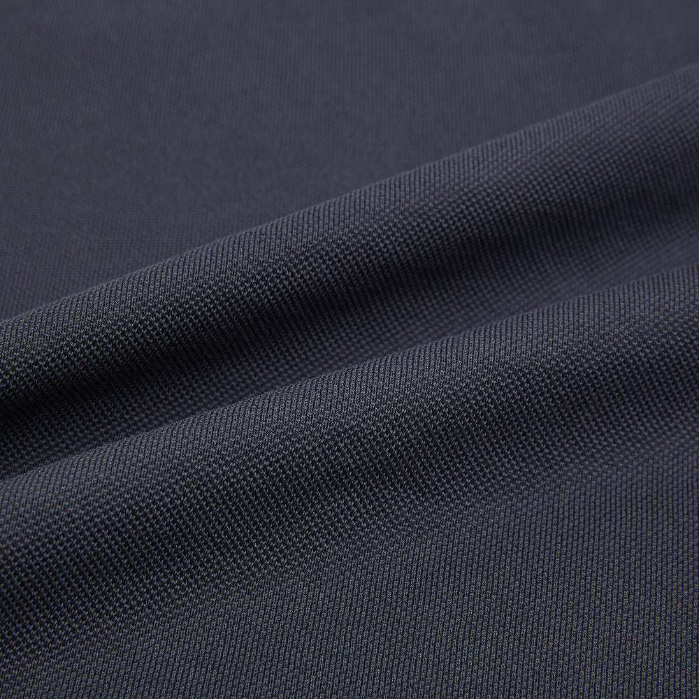 The Charcoal Rugby Polo Shirt by Turnbull & Asser is a pure cotton, long-sleeve polo in charcoal grey, featuring a collared open V-neck with no buttons, displayed flat on a white background.