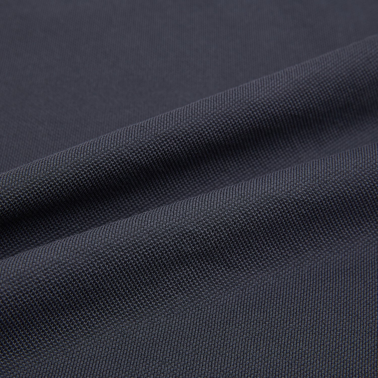 View 6 of product The Charcoal Rugby Polo Shirt by Turnbull & Asser is a pure cotton, long-sleeve polo in charcoal grey, featuring a collared open V-neck with no buttons, displayed flat on a white background.