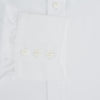 View 3 of product The Turnbull & Asser White Sea Island Quality Cotton Shirt features a T&A collar and 3-button cuffs, crafted from premium cotton and showcased against a plain white background.