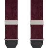 View 2 of product The Turnbull & Asser Burgundy Paisley Adjustable Silk Braces feature black leather loops and silver adjusters, shown on a plain white background.