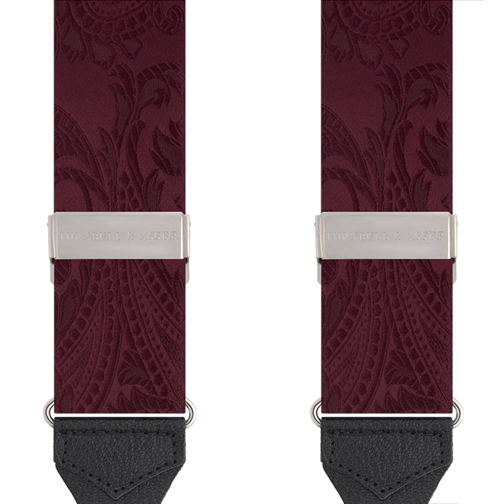 The Turnbull & Asser Burgundy Paisley Adjustable Silk Braces feature black leather loops and silver adjusters, shown on a plain white background.